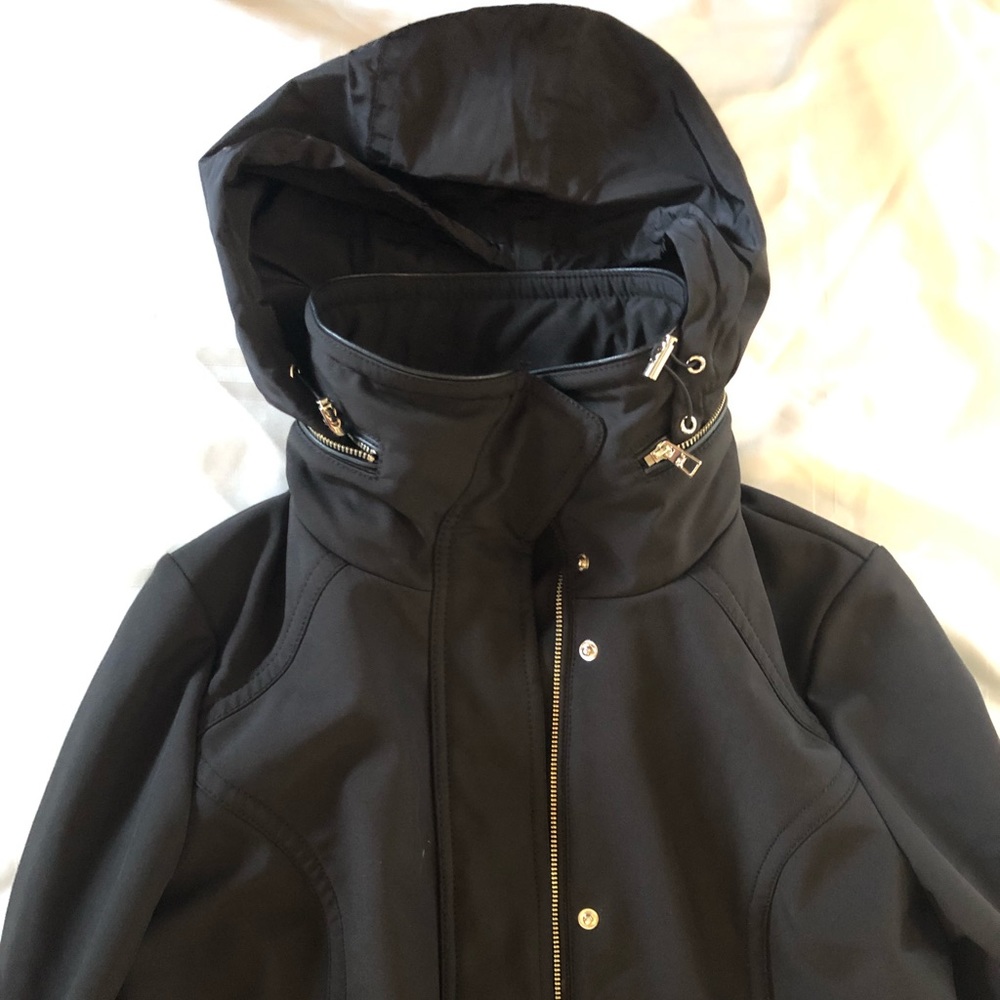 Eliza J lined rain coat. Size M.